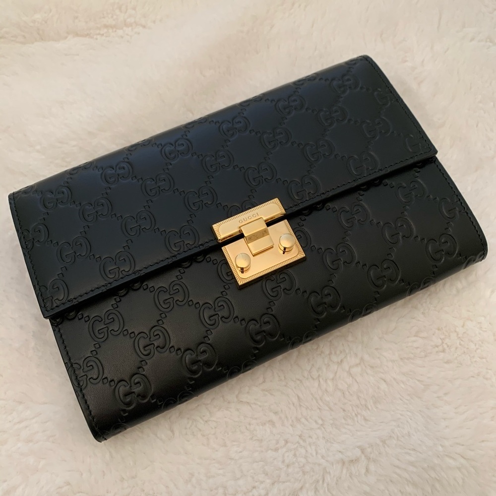 Gucci Black GG Embossed Leather Clutch with Gold Lock